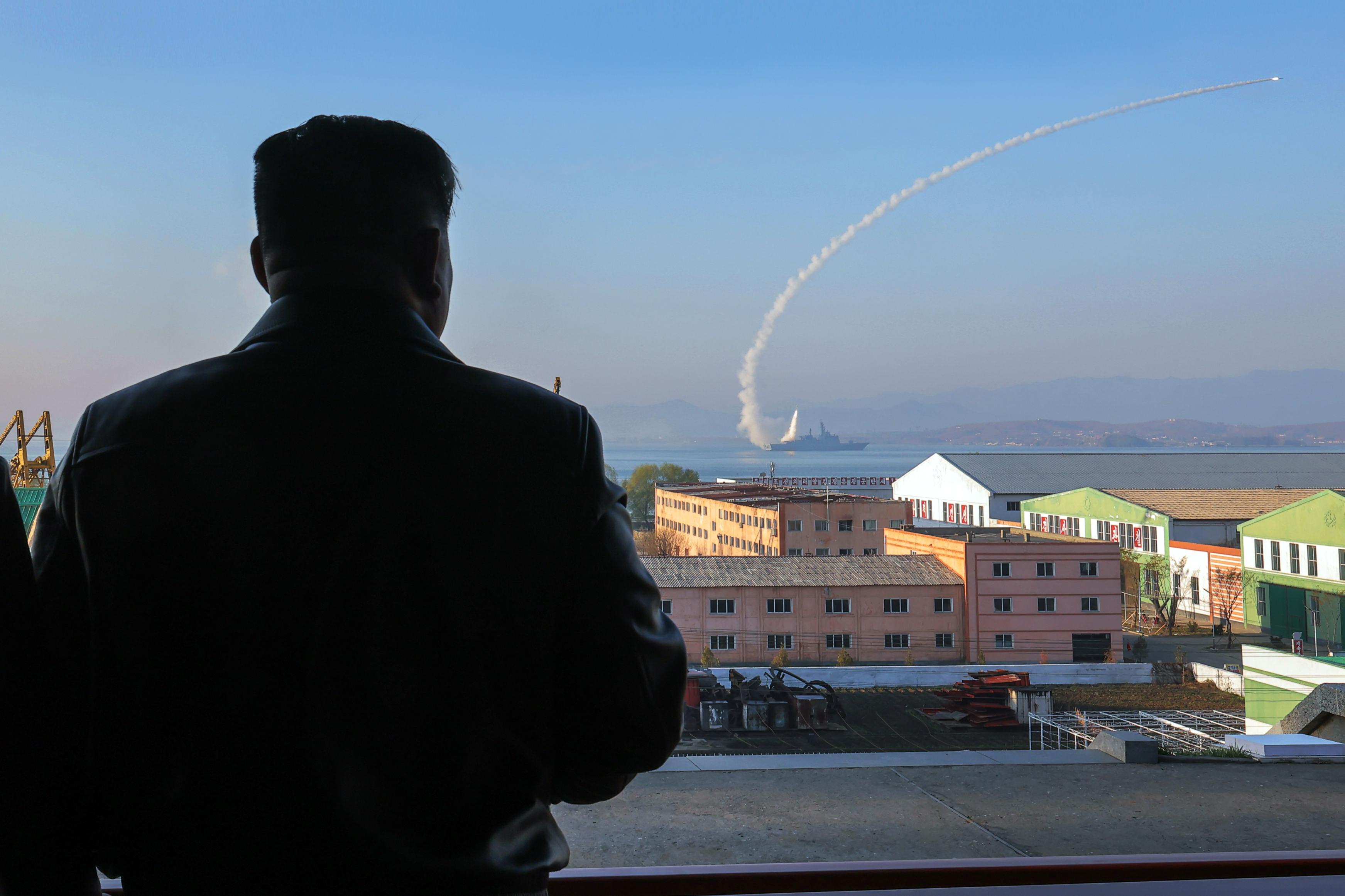 Kim Jong Un observes missile test launch from North Korea's first destroyer